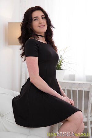 Brunette starlet kneels down to take a fat dick in her throat