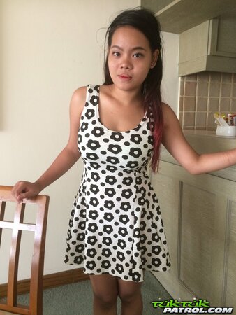 Cute Thai babe shows off her jugs to her new white friend