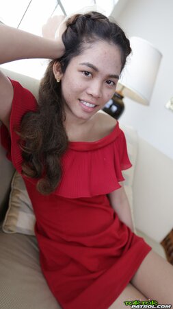 Sweet Thai teen has fun walking with a foreign photographer