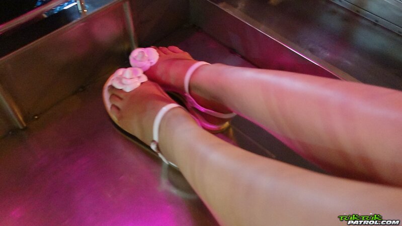 Sweet Thai teen has fun walking with a foreign photographer