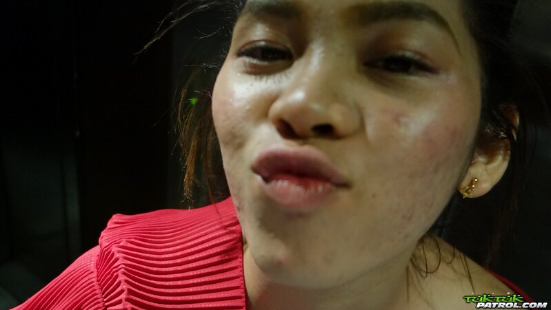 Sweet Thai teen has fun walking with a foreign photographer