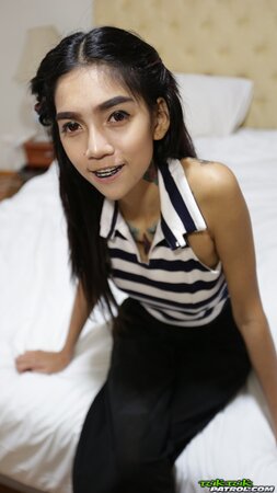 Slender Asian teen comes to a tourist's hotel room to pose naked