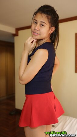 Horny Asian cutie teases with her perky tits and a trimmed muff