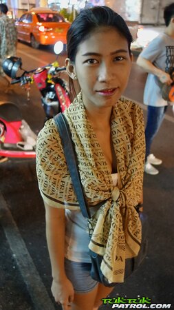 Skinny Thai teen shows off her perky tits and a hairy pussy