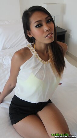 Brunette Asian in a sexy bikini wants you to kiss the screen