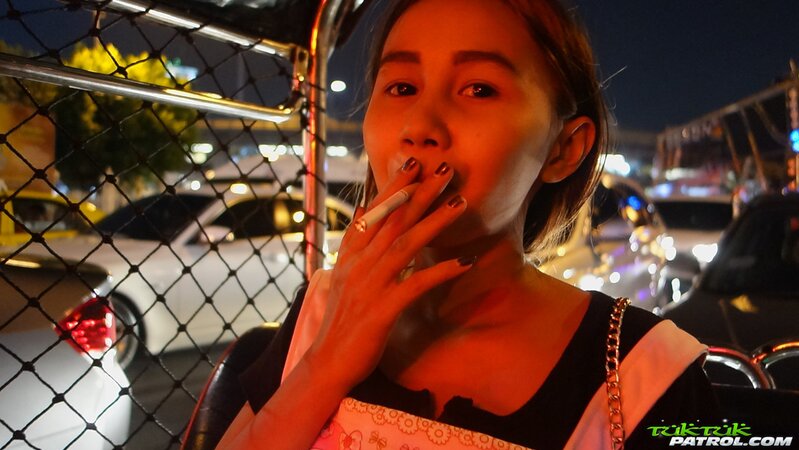 Edgy Thai babe named Puy is going to smoke and tease in overalls