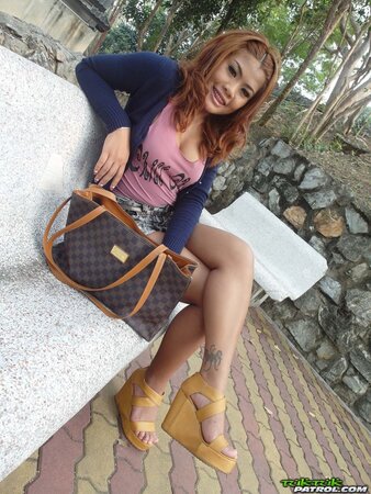 Redheaded braceface babe named Nicki is seeking orgasms