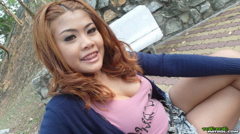 Redheaded braceface babe named Nicki is seeking orgasms