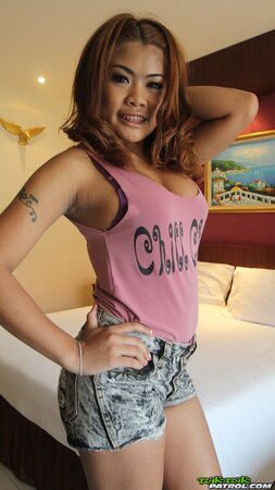 Redheaded braceface babe named Nicki is seeking orgasms