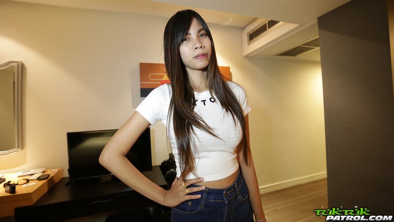 Thai chick with big tits shows her pointy nipples and such