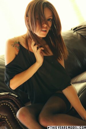 Playful brunette Ashley Doll is going to show her pussy too