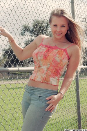 Natural boobs blondie playing around and smiling at you too