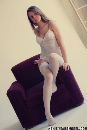 Michelle Jean showing her sexy legs in white stockings too