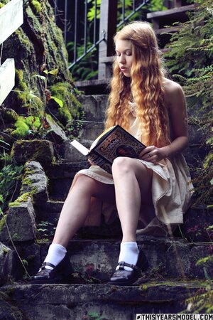 Blonde angelic nymph gets rid of her clothes once she's outdoors