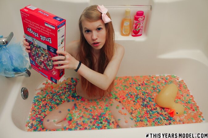 Silly teen doll is being cute and naughty while taking a bath