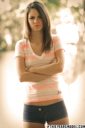 Long-legged model Aspen Martin shows off her tight booty