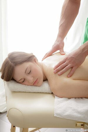 Blonde kisses cock before fucking on the massage table