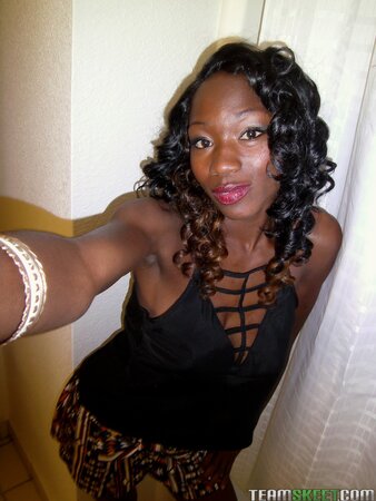 Black stunner with a firm ass squatting on a guy's hard cock