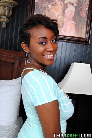 Short hair hottie shows her ginormous black tits for fun