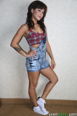 Small teen Mia Austin gets naked to show her young naked body