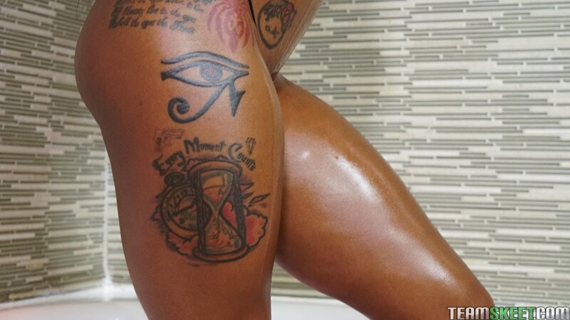 Stacked ebony Sarai Minx shows off her big boobs before hard sex