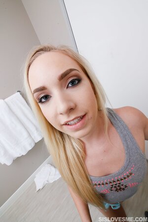 Her medium-blonde, short, straight hair looks really sexy today