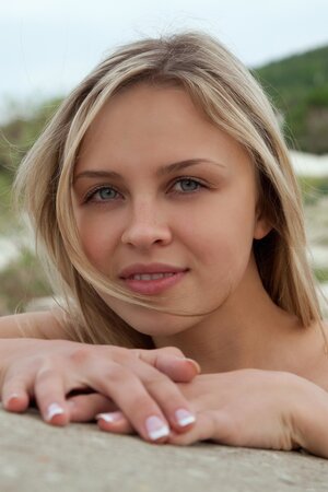 Stellar blondie looks cute as she showcases her backside