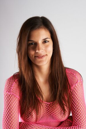 Leggy brunette Red Fox shows her ass and legs in a hot way