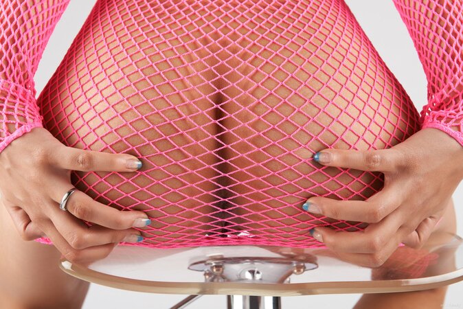 Leggy brunette Red Fox shows her ass and legs in a hot way