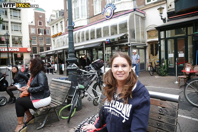 Curvy girl with a goofy hairdo showing her stuff in public