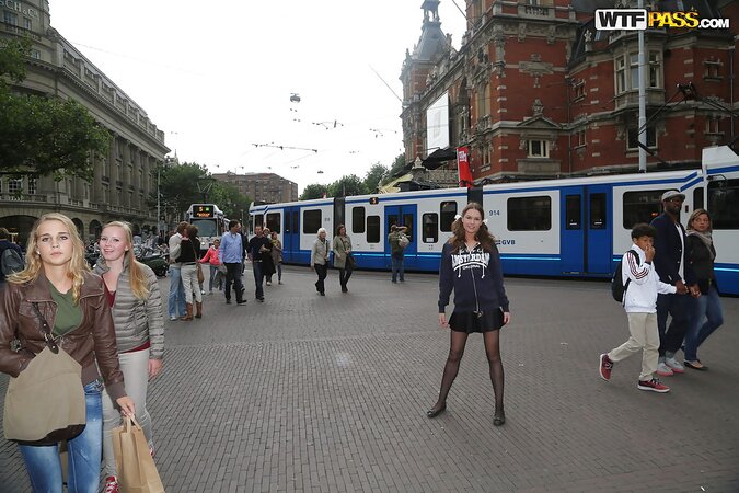 Curvy girl with a goofy hairdo showing her stuff in public