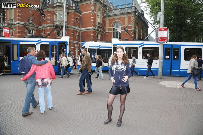 Curvy girl with a goofy hairdo showing her stuff in public