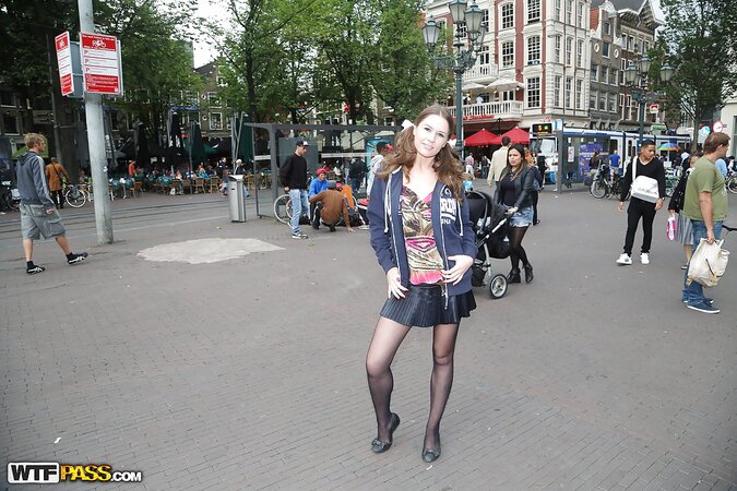 Curvy girl with a goofy hairdo showing her stuff in public