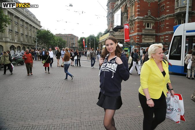 Curvy girl with a goofy hairdo showing her stuff in public