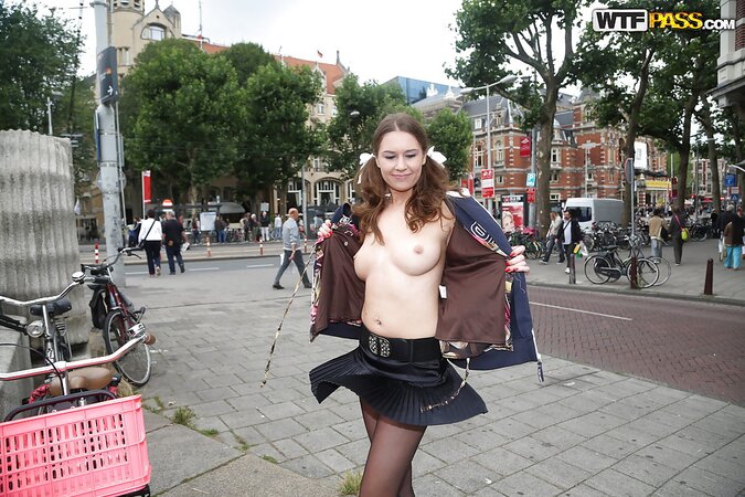 Curvy girl with a goofy hairdo showing her stuff in public