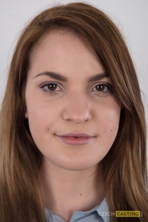 She has a signature boring office style that makes her sexy