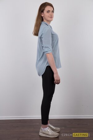 She has a signature boring office style that makes her sexy