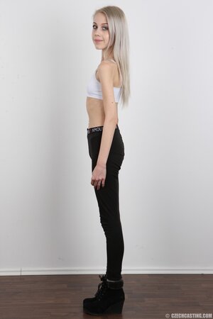 Thin as fuck teen showing off her non existent ass for the cam