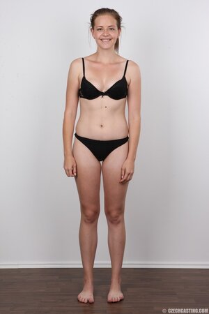 Pretty babe in black lingerie showing off her amazing body