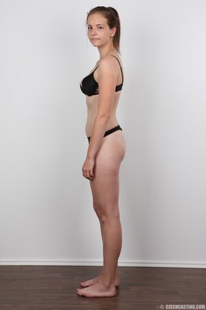 Pretty babe in black lingerie showing off her amazing body