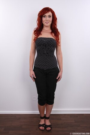 She enthusiastically does a mini posing session in this one