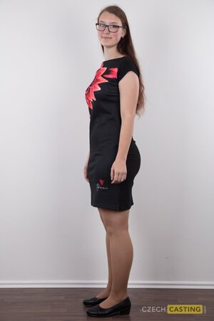 Overjoyed solo girl showing off her meaty ass and natural breasts