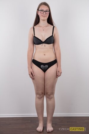 Overjoyed solo girl showing off her meaty ass and natural breasts