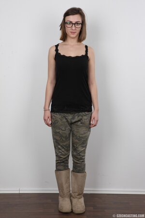 Glasses wearing stunner Vendula shows her boobs and legs