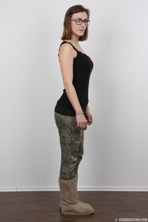 Glasses wearing stunner Vendula shows her boobs and legs