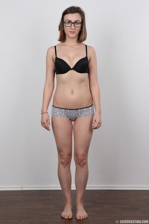 Glasses wearing stunner Vendula shows her boobs and legs