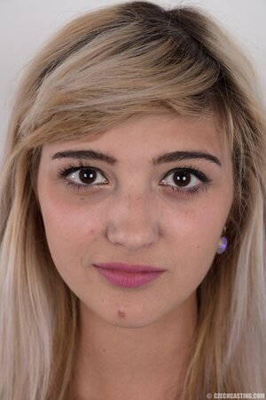 Karolina the kinky teen is showing off her nice boobies