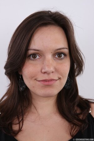 Iwia showing her natural breasts with confidence in this one