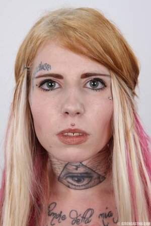 Edgy girl with a sexy body showing off her goodies solo