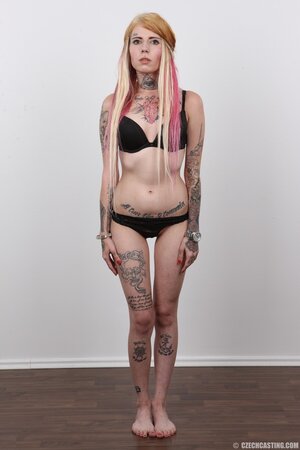 Edgy girl with a sexy body showing off her goodies solo